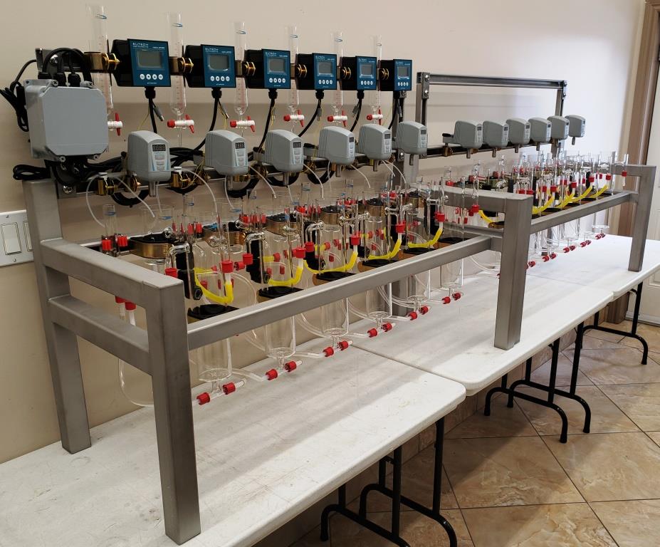 Laboratory scale solvent extraction pilot plant with 18 mixer-settler stages.